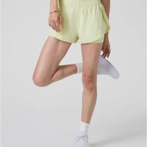Vuori Women's Light Yellow Shorts 	
Luna Short
Color: Lemongrass
Size: M
